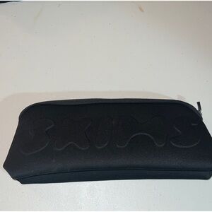 SKIMS Black Embossed Pouch